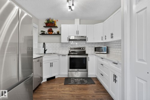 15174 22 Street Nw, Edmonton, AB - Indoor Photo Showing Kitchen With Upgraded Kitchen