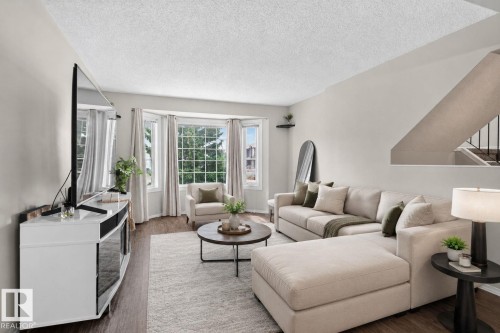 15174 22 Street Nw, Edmonton, AB - Indoor Photo Showing Living Room
