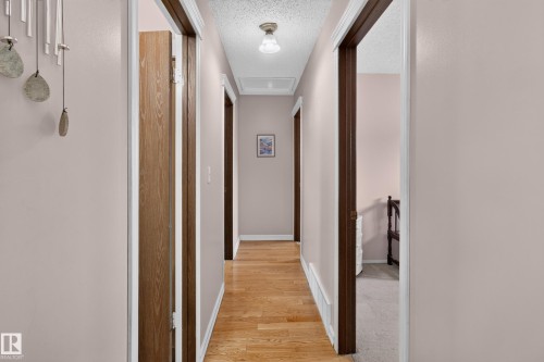 leading to the 3 bedrooms - 14546 19 Street Nw, Edmonton, AB 