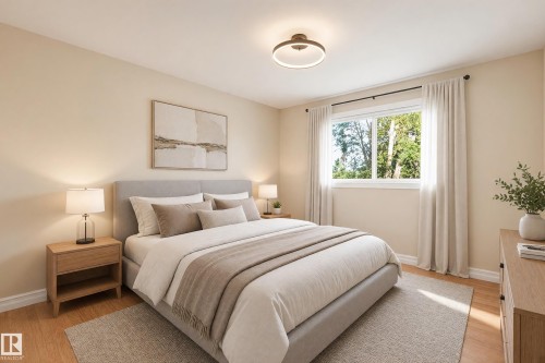 Hardwood-style flooring, large window with ample natural light, neutral wall tones, modern ceiling light fixture, and white trim - 3523 106 Street Nw, Edmonton, AB 