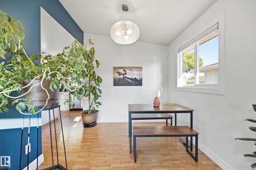 Bright interior with wood-finish flooring - 3523 106 Street Nw, Edmonton, AB 