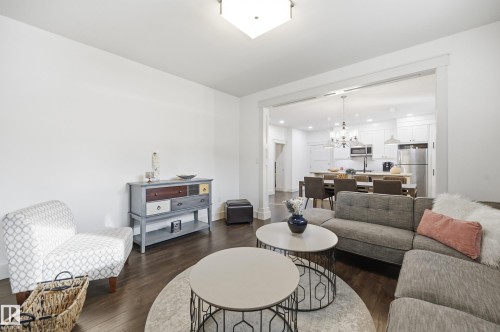 White walls, recessed lighting, and wood-finish flooring - 1961 Adamson Terrace Sw, Edmonton, AB 
