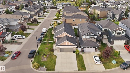 Paved neighborhood streets with manicured lawns and mature trees - 1961 Adamson Terrace Sw, Edmonton, AB 