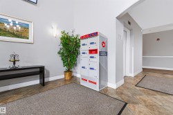 Parcel locker system, wall-mounted lighting, and an elevator access - 