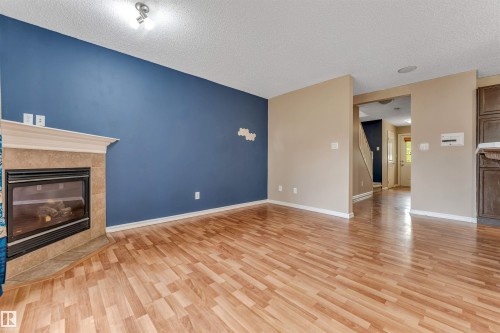 7743 8 Avenue Sw, Edmonton, AB - Indoor With Fireplace