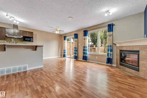 7743 8 Avenue Sw, Edmonton, AB - Indoor With Fireplace