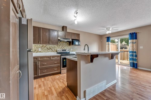 7743 8 Avenue Sw, Edmonton, AB - Indoor Photo Showing Kitchen With Upgraded Kitchen