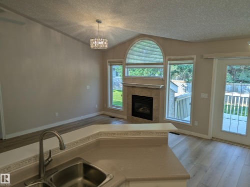 211 Youville Drive Nw, Edmonton, AB - Indoor With Fireplace