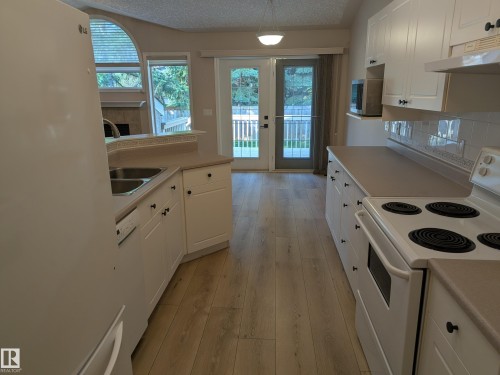 211 Youville Drive Nw, Edmonton, AB - Indoor Photo Showing Kitchen With Double Sink
