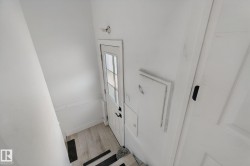 White paneled door with divided lite glass - 