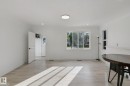 White walls with recessed lighting and a flush-mount ceiling fixture - 11914 124 Street Nw, Edmonton, AB 