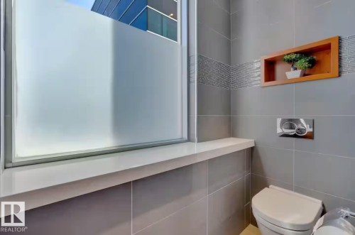 Frosted privacy window with a floating sill - #701 10105 109 St Nw, Edmonton, AB 