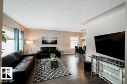 Wood-finish flooring throughout the main living area - 