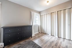 Room featuring light wood-finish flooring and neutral wall paint - 