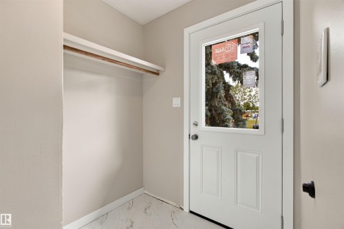 White paneled door with clear glass insert - 9908 99 Street, Morinville, AB 