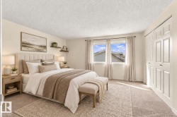 Carpeted flooring extending throughout, dual windows with curtain rods, and bi-fold closet doors - 