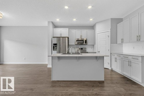 1064 Cy Becker Road Nw, Edmonton, AB - Indoor Photo Showing Kitchen With Upgraded Kitchen
