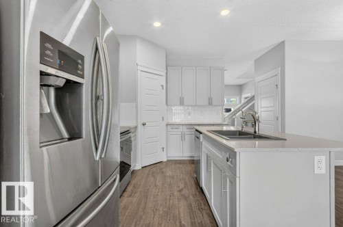 1064 Cy Becker Road Nw, Edmonton, AB - Indoor Photo Showing Kitchen With Double Sink With Upgraded Kitchen