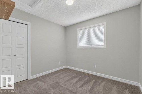 1064 Cy Becker Road Nw, Edmonton, AB - Indoor Photo Showing Other Room