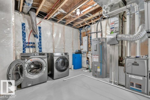 1064 Cy Becker Road Nw, Edmonton, AB - Indoor Photo Showing Laundry Room
