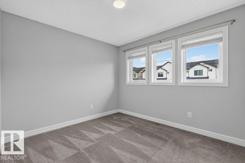 1064 Cy Becker Road Nw, Edmonton, AB - Indoor Photo Showing Other Room