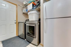 White paneled door with wood trim - 
