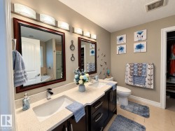 Dual vanity with integrated sinks and chrome faucets - 