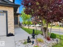 Stone veneer exterior detailing - 144 52 Street Sw, Edmonton, AB 