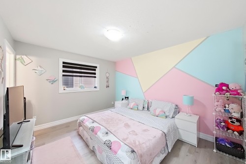 Window with horizontal blinds - 144 52 Street Sw, Edmonton, AB 