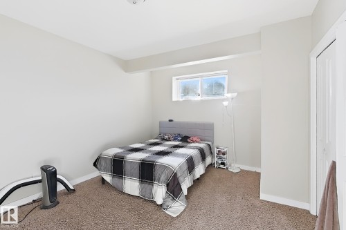Wall-to-wall carpeting with a neutral color palette - 144 52 Street Sw, Edmonton, AB 