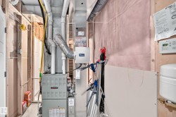 Installed HVAC system with ductwork and a humidifier unit - 