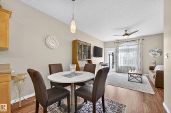 Wood-finish flooring throughout the dining and living spaces - 