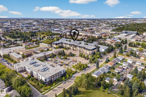 Aerial representation of a residential area featuring multiple buildings and surrounding landscaping - #420 9820 165 St Nw, Edmonton, AB 