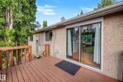 Expansive wood deck with a full-height railing - 