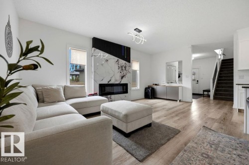 13703 166 Avenue Nw, Edmonton, AB - Indoor Photo Showing Living Room With Fireplace