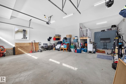 Expansive garage space triple with one bay a tandem garage - 94 Westlin Drive, Leduc, AB 