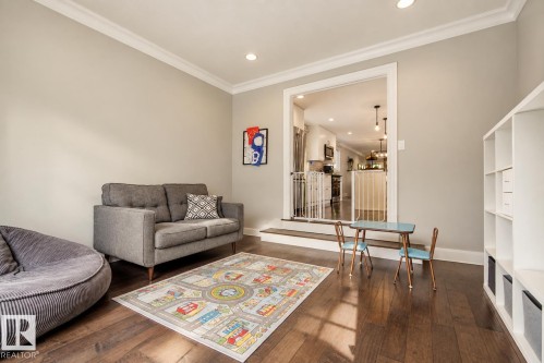 Hardwood flooring, recessed lighting, crown molding, and a wide doorway - 11 Brunswick Crescent, St. Albert, AB 