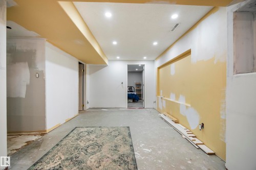 Recessed ceiling lighting, dropped ceiling soffit, framed wall niches, and unfinished concrete flooring - 11 Brunswick Crescent, St. Albert, AB 