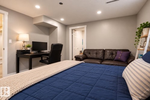 Recessed lighting illuminates neutral-toned walls - 11 Brunswick Crescent, St. Albert, AB 