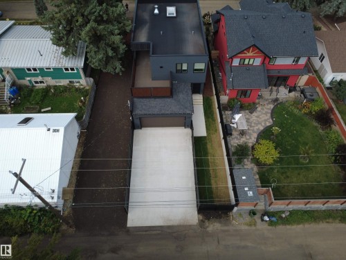 Dark gray exterior with a flat roofline - 8815 142 Street Nw, Edmonton, AB 
