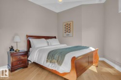 Wood-finish flooring with light-toned walls - 