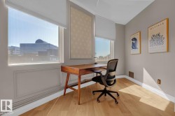 Wood-finish flooring with crisp white baseboards - 