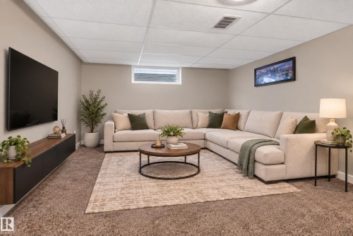 Recessed lighting, wall-to-wall carpeting, and a drop ceiling - 9826 180 Avenue Nw, Edmonton, AB 