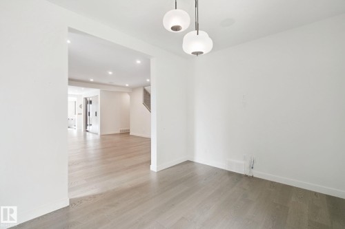 Open doorway leading to a spacious interior - 10925 University Avenue Nw, Edmonton, AB 