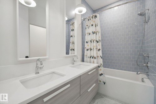Dual vanity with integrated sinks and chrome fixtures - 10925 University Avenue Nw, Edmonton, AB 