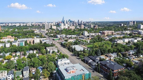 Expansive city skyline, dense urban development, abundant tree canopy, established neighborhood, and broad thoroughfare - 10925 University Avenue Nw, Edmonton, AB 