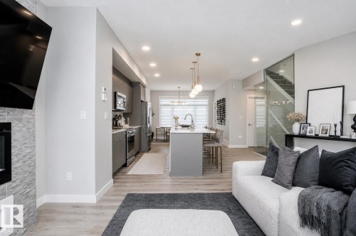 #82 50 Ebony Bv, Sherwood Park, AB - Indoor Photo Showing Living Room With Fireplace