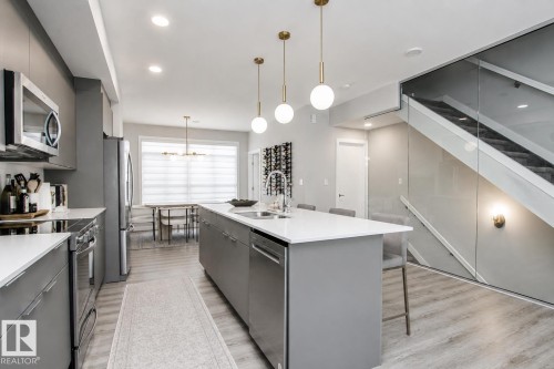 #82 50 Ebony Bv, Sherwood Park, AB - Indoor Photo Showing Kitchen With Stainless Steel Kitchen With Double Sink With Upgraded Kitchen