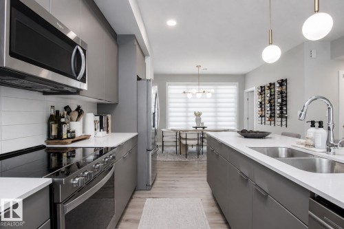 #82 50 Ebony Bv, Sherwood Park, AB - Indoor Photo Showing Kitchen With Double Sink With Upgraded Kitchen