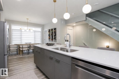 #82 50 Ebony Bv, Sherwood Park, AB - Indoor Photo Showing Kitchen With Double Sink With Upgraded Kitchen
